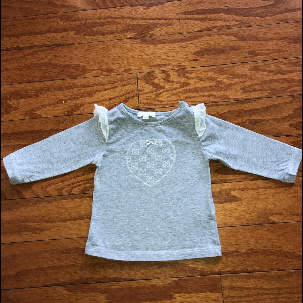 Baby girls Gucci shirt.